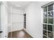 Bright walk-in closet with built-in shelving and a large window for natural light at 17318 Cambridge Grove Dr, Huntersville, NC 28078