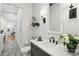 Elegant bathroom with a decorative vanity and a marble countertop plus a mirror with a white frame at 1737 Hwy 109 N Hwy, Troy, NC 27371