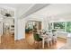 Elegant dining room with wood floors, large windows and views into living room at 1737 Hwy 109 N Hwy, Troy, NC 27371
