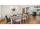 Dining room featuring a wood table, chandelier and views into kitchen at 1737 Hwy 109 N Hwy, Troy, NC 27371