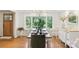 Dining room showcasing wood floors, table with chairs, chandelier and natural light at 1737 Hwy 109 N Hwy, Troy, NC 27371