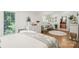 Cozy main bedroom with hardwood floors and ensuite bathroom at 1737 Hwy 109 N Hwy, Troy, NC 27371