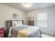 Bedroom with a grey upholstered headboard and carpeted floors at 2009 Talbert Ct, Charlotte, NC 28214