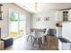 Bright dining area with sliding glass doors leading to the backyard at 2009 Talbert Ct, Charlotte, NC 28214
