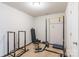 Spacious home gym featuring workout equipment including a weight bench and pull up bars at 2009 Talbert Ct, Charlotte, NC 28214
