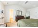 Bright main bedroom with lots of closet space and carpeted floors at 2009 Talbert Ct, Charlotte, NC 28214
