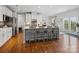 Open kitchen boasts a large island with bar stool seating and stainless appliances at 2178 Stone Pile Sw Dr, Concord, NC 28025