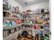 Walk-in pantry offers generous shelving for ample storage at 2178 Stone Pile Sw Dr, Concord, NC 28025