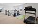 Spacious workout area with exercise equipment, and bright natural light at 2178 Stone Pile Sw Dr, Concord, NC 28025
