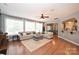 Spacious living room featuring hardwood floors and comfortable seating at 2300 Lord Anson Dr, Waxhaw, NC 28173