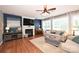 Comfortable living room featuring a fireplace and bright natural light at 2300 Lord Anson Dr, Waxhaw, NC 28173