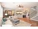 Open living space with hardwood floors, archways, and stairs to upper level at 2300 Lord Anson Dr, Waxhaw, NC 28173