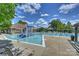 Community pool with a slide and a waterfall feature for Gathering fun at 2300 Lord Anson Dr, Waxhaw, NC 28173