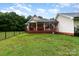 Back porch offers a covered area and plenty of room for entertainment at 2451 Reepsville Rd, Lincolnton, NC 28092