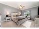 Comfortable bedroom featuring a ceiling fan and natural light from the window with decor at 2451 Reepsville Rd, Lincolnton, NC 28092
