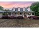 Charming home featuring a covered front porch, dormer windows and a beautiful stone driveway at 2451 Reepsville Rd, Lincolnton, NC 28092