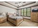 Relaxing bedroom features a large window, plush bed, and ample closet space at 270 Sandhills Ct, Mooresville, NC 28115