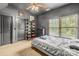 Modern bedroom has neutral tones, bright windows, and built-in storage at 270 Sandhills Ct, Mooresville, NC 28115