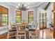Dining room features a round table and hardwood floors at 270 Sandhills Ct, Mooresville, NC 28115