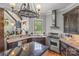 Well-equipped kitchen with island, stainless steel appliances, and dark wood cabinets at 270 Sandhills Ct, Mooresville, NC 28115