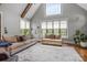 Spacious living room features natural light, hardwood floors and comfortable seating at 270 Sandhills Ct, Mooresville, NC 28115