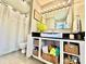 This bathroom features a modern vanity, a vessel sink, and stylish storage baskets, offering both functionality and charm at 2810 Elizabeth Ave, Shelby, NC 28150