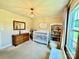 Charming Bedroom with a crib, dresser, chandelier, and soft lighting, perfect for creating a cozy and comforting space at 2810 Elizabeth Ave, Shelby, NC 28150