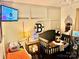Charming Bedroom with crib, side table, decorative wall art, and television at 312 Shady Ln, Lincolnton, NC 28092