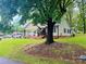 Beautiful home with mature trees and a well maintained lawn at 312 Shady Ln, Lincolnton, NC 28092