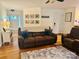 Spacious living room with hardwood floors, comfortable seating, and natural light at 312 Shady Ln, Lincolnton, NC 28092