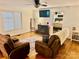 Comfortable living room featuring an electric fireplace and modern furniture at 312 Shady Ln, Lincolnton, NC 28092