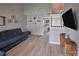 Inviting living room featuring wood floors, tall ceilings, and an open floor plan at 327 Wilkes Place Dr, Fort Mill, SC 29715