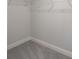 A carpeted closet with white trim and white walls at 4045 Port Richmond Ave # 10, Gastonia, NC 28056