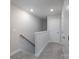 Upstairs hallway with carpet and white trim at 4045 Port Richmond Ave # 10, Gastonia, NC 28056