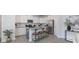 Modern kitchen showcasing white cabinetry, granite countertops, stainless steel appliances, and an island with seating at 4045 Port Richmond Ave # 10, Gastonia, NC 28056