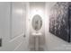 Stylish powder room with pedestal sink and decorative artwork at 4045 Port Richmond Ave # 10, Gastonia, NC 28056