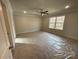Spacious bedroom with large windows providing natural light and ceiling fan at 4049 Port Richmond Ave # 10, Gastonia, NC 28056