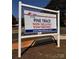 Adams Homes sign advertising Pine Trace townhomes for sale, showcasing the community's website at 4049 Port Richmond Ave # 10, Gastonia, NC 28056