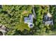 Aerial view of estate with pool, lawn, and surrounded by trees at 408 Emerald Bay Dr, Salisbury, NC 28146