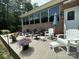 Relaxing back deck with multiple seating areas, perfect for entertaining or enjoying the outdoors at 408 Emerald Bay Dr, Salisbury, NC 28146