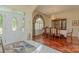 Formal dining room showcasing hardwood floors, a chandelier, and a large wooden china cabinet at 408 Emerald Bay Dr, Salisbury, NC 28146