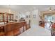 Formal dining room with hardwood floors and elegant furnishings, open to the living area at 408 Emerald Bay Dr, Salisbury, NC 28146