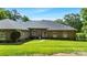 Charming brick home with manicured front lawn and lush landscaping at 408 Emerald Bay Dr, Salisbury, NC 28146
