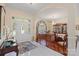 Elegant foyer with stained glass front door, chandelier, and dining room access at 408 Emerald Bay Dr, Salisbury, NC 28146