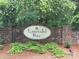 Stone sign with 'Emerald Bay' lettering surrounded by trees and greenery at 408 Emerald Bay Dr, Salisbury, NC 28146