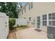 Fenced backyard with small patio area, connecting to the house with easy access to outdoors at 4368 Yoruk Forest Ln, Charlotte, NC 28211