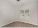 Bedroom featuring neutral carpet, base molding, and natural light at 4368 Yoruk Forest Ln, Charlotte, NC 28211