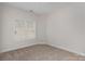 Carpeted bedroom with neutral tones and bright window with coverings at 4368 Yoruk Forest Ln, Charlotte, NC 28211