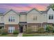 Charming townhome featuring a brick and vinyl exterior with well-maintained landscaping at 4368 Yoruk Forest Ln, Charlotte, NC 28211