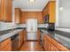 Well-equipped kitchen with stainless steel appliances and granite countertops at 4368 Yoruk Forest Ln, Charlotte, NC 28211